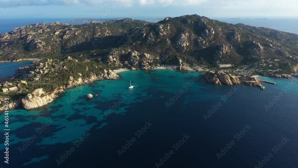View from above, aerial shot, stunning view of Spargi Island with Cala Corsara, a white sand beach bathed by a turquoise water. La Maddalena archipelago National Park, Sardinia, Italy. View from above, aerial shot, stunning view of Spargi Island with Cala Corsara, a white sand beach bathed by a turquoise water. La Maddalena archipelago National Park, Sardinia, Italy.