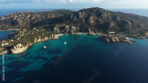 View from above, aerial shot, stunning view of Spargi Island with Cala Corsara, a white sand beach bathed by a turquoise water. La Maddalena archipelago National Park, Sardinia, Italy.