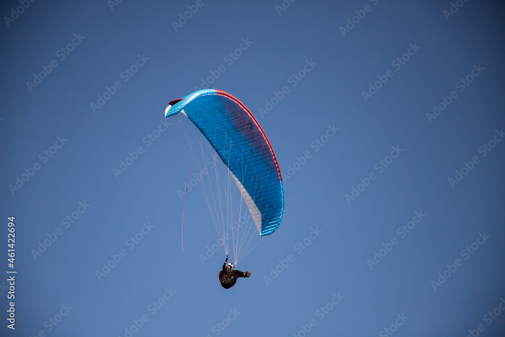 glider paragliding g against blue sky flying adrenaline and freedom concept glider paragliding g against blue sky flying adrenaline and freedom concept