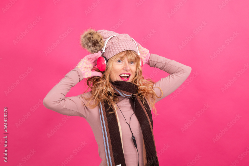 adult woman with headphones dancing on isolated