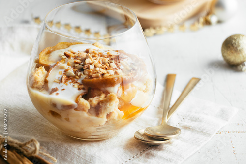 Baked apple dessert in a glass for Christmas photo