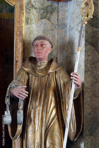 St. Leonard, a statue on the altar of Saint Valentine in the Church of the Visitation of the Virgin Mary in Vinagora, Croatia photo