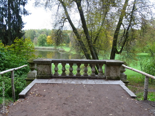Viewpoint balustrade in autumn park: river view