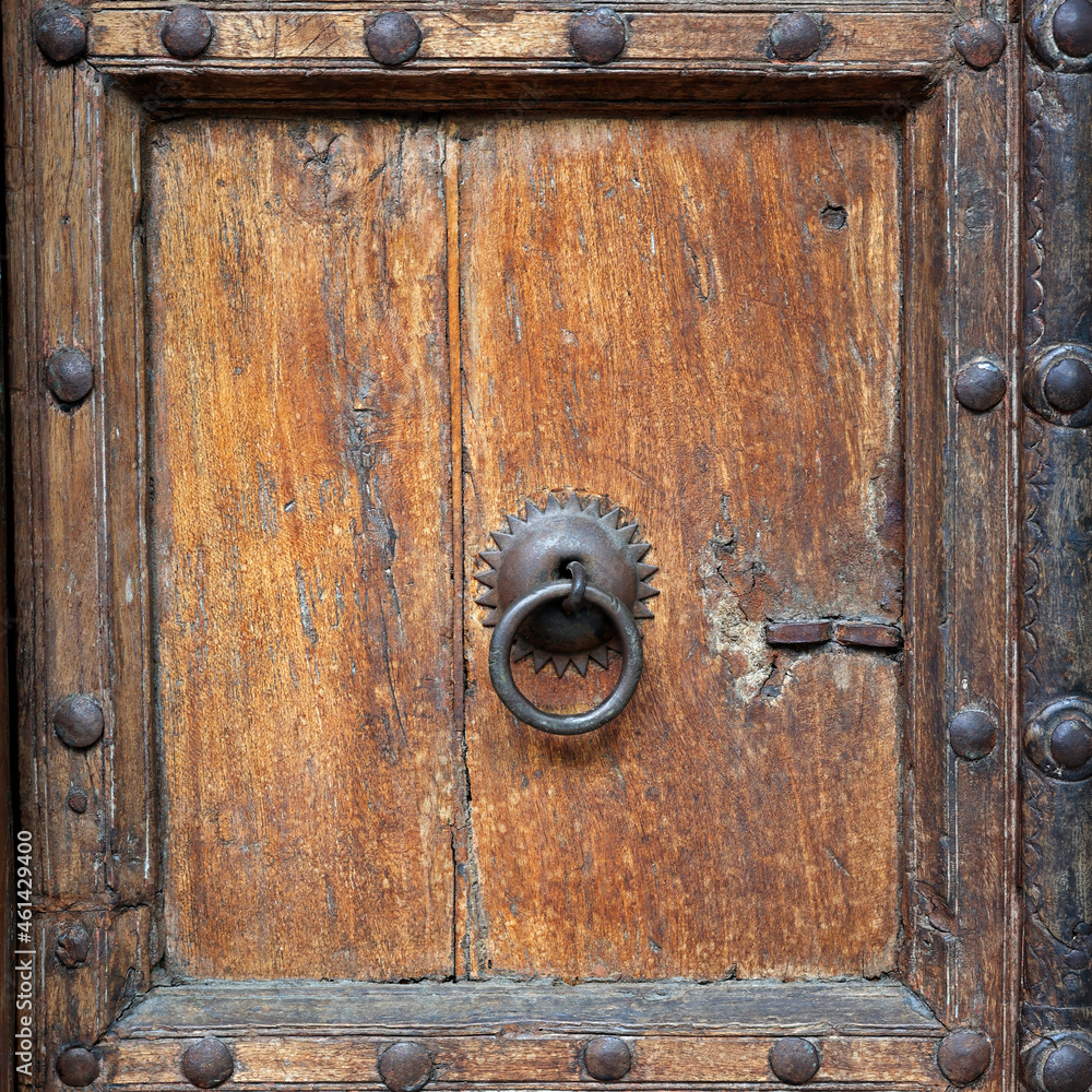 antique wooden door with brass door handle antique wooden door with brass door handle