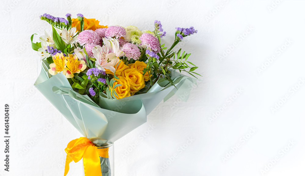 Εκτύπωση καμβά A beautiful flower bouquet is tied with a yellow silk ribbon