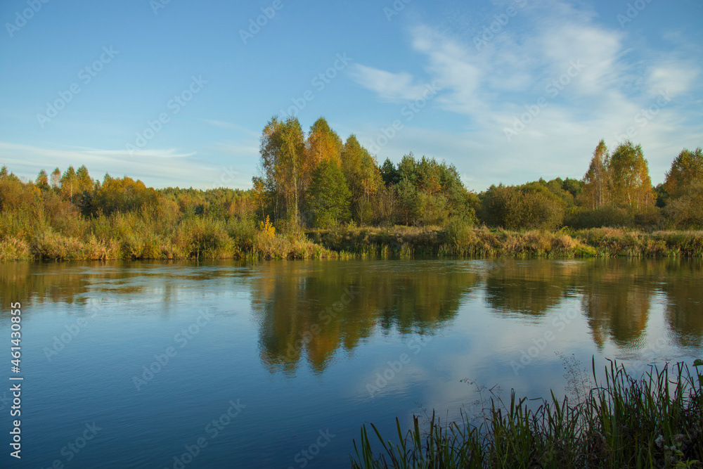 photo of the river on a sunny autumn day