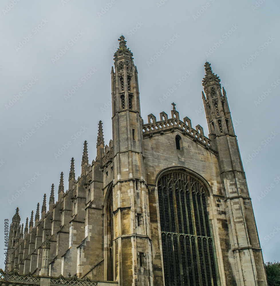 Facade of Gothic King's College Chapel with ornate stained glass windows in Cambridge England