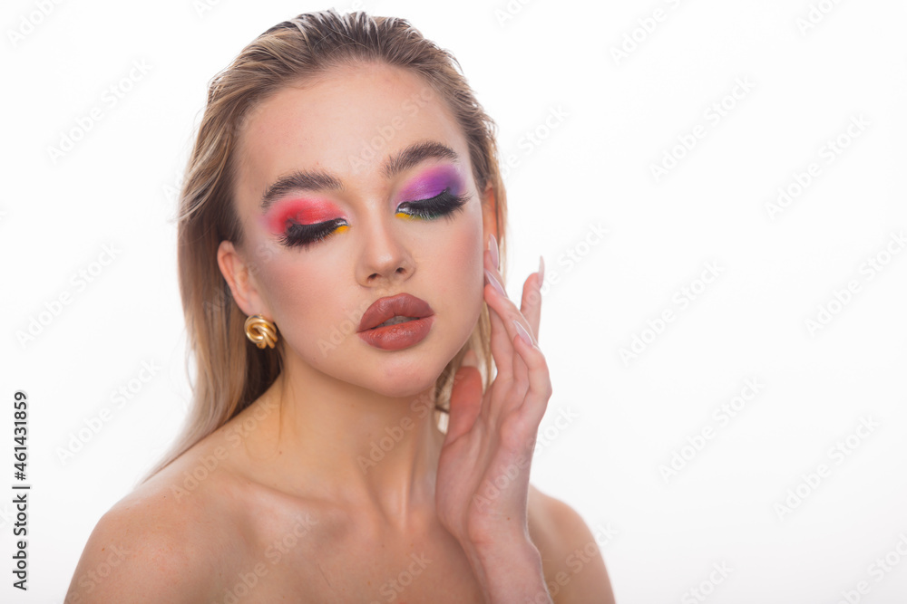Fototapeta premium Beauty woman portrait. Professional makeup for model with blue eyes and big plump lips. Red lipstick, colored smoky eyes. Isolated on a white background. Space for text