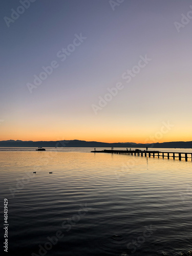 Wallpaper Mural Idyllic orange sunset at the lake, silhouette of the mountains background Torontodigital.ca