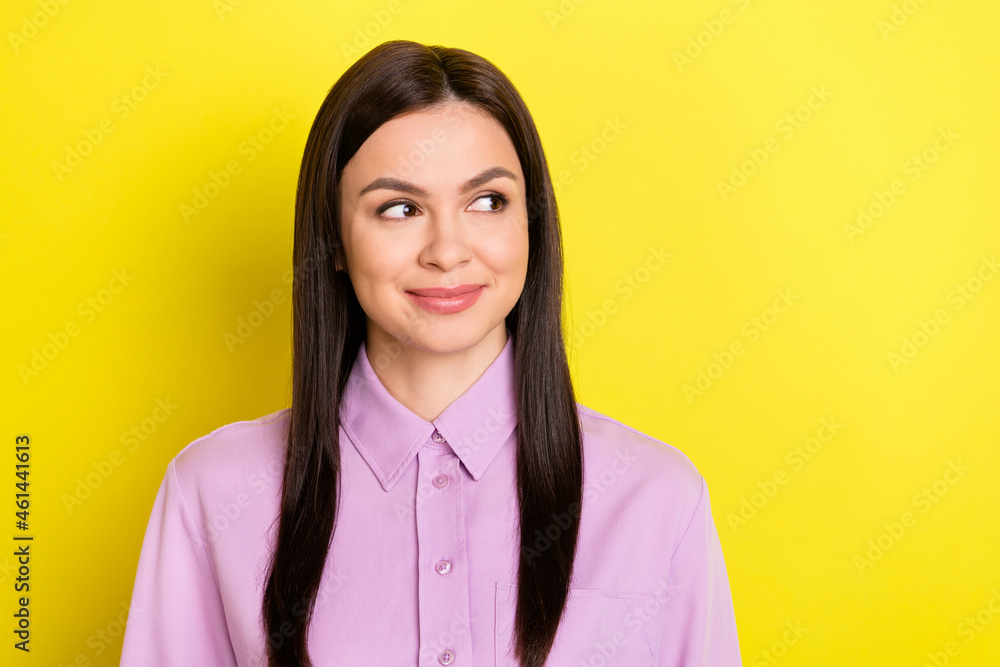 Photo of cute brown hairdo young lady look empty space wear purple shirt isolated on yellow color background Photo of cute brown hairdo young lady look empty space wear purple shirt isolated on yellow color background