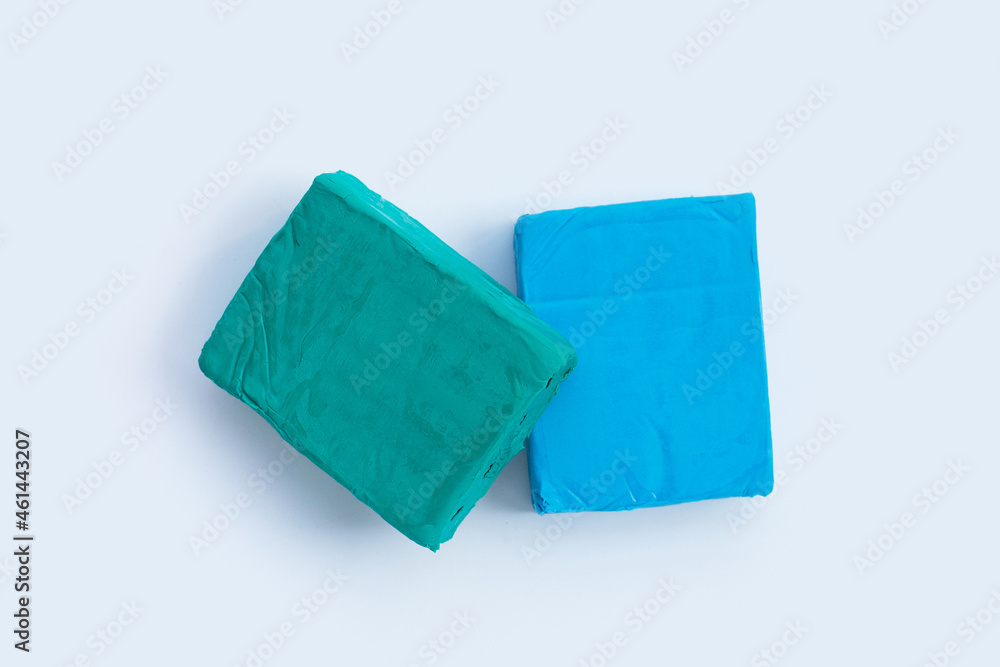 Fototapeta premium Colorful plasticine clay on white background.