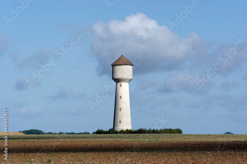 Water tower and plowed land in the Beauce region