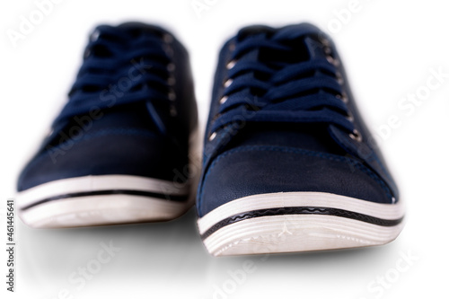 blue men's summer sneakers isolated on white. Selective focus
