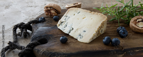 gorgonzola cheese on wooden board photo