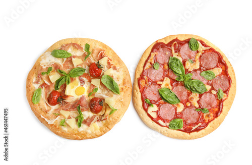 Delicious pita pizzas on white background, top view