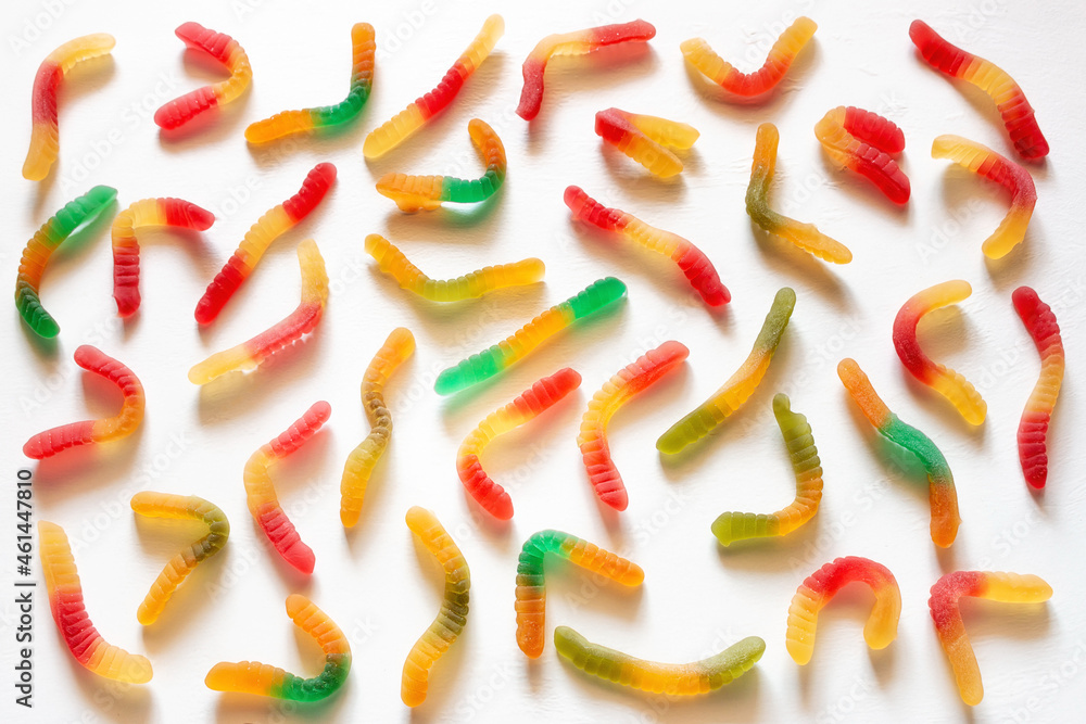 Fototapeta premium multicolored gummy worms isolated on white background
