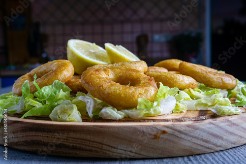 Calamares a la romana o rebozados, plato y tapa típica de los bares y restaurantes españoles. Comida de España
 photo