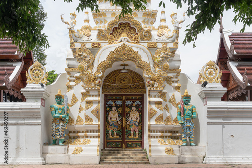 Exterior view of gate to City Pillar Shrine with intricate decoration, Chiang Mai, Thailand