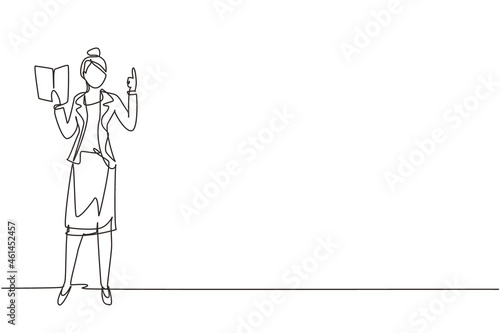 Single continuous line drawing young woman professor standing in front of class with book on her hands, female teacher students in classroom at school. One line draw graphic design vector illustration
