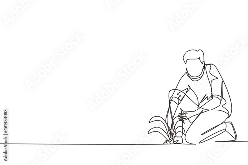 Continuous one line drawing young man plants, protects tree seedling or plant. Startup new beginning concept. Agricultural worker with organic natural crop. Single line draw design vector illustration