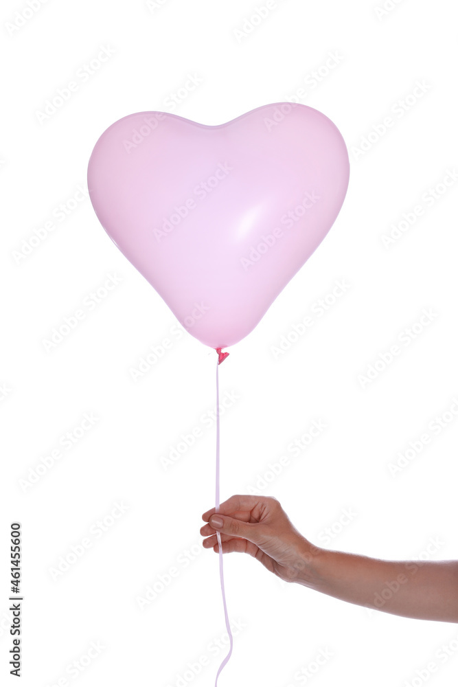 Woman holding heart shaped balloon isolated on white, closeup