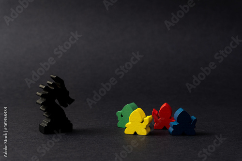 Dragon and warrior meeples. Board game.