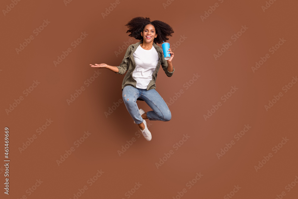 Full size of excited crazy cheerful lady hand hold cup have good mood isolated on brown color background Full size of excited crazy cheerful lady hand hold cup have good mood isolated on brown color background