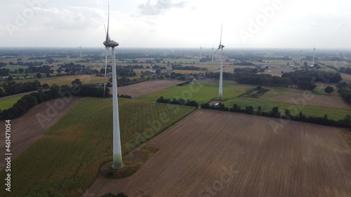 Pair of windmills on countryside drone shot photo