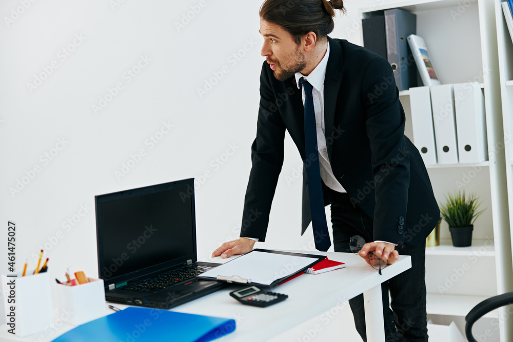 man in a suit official documents work office executive man in a suit official documents work office executive