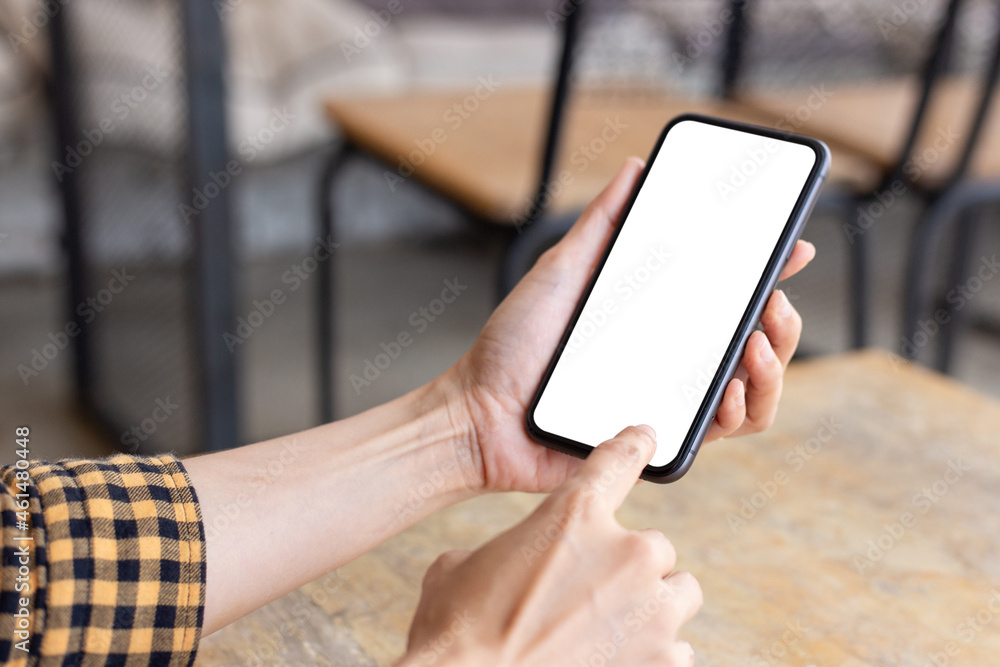 cell phone blank white screen mockup.hand holding texting using mobile on desk at office.background empty space for advertise.work people contact marketing business,technology