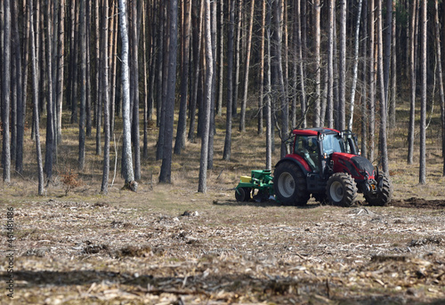 tractor in the forest during forestry work