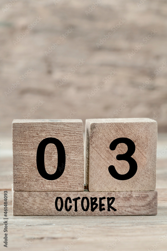 cube calendar for october on wooden background with copy space cube calendar for october on wooden background with copy space