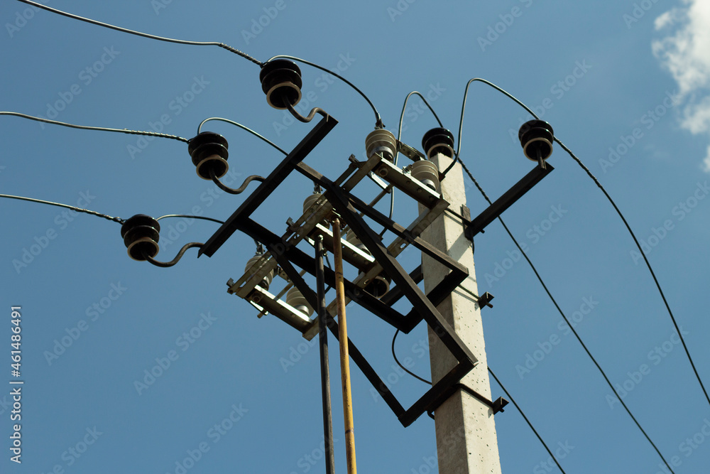 Pole with electricity. Lots of high-current wires. Pole with electricity. Lots of high-current wires.