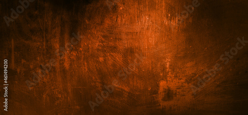 Orange wall with dark shadows. Dark orange cement for the background