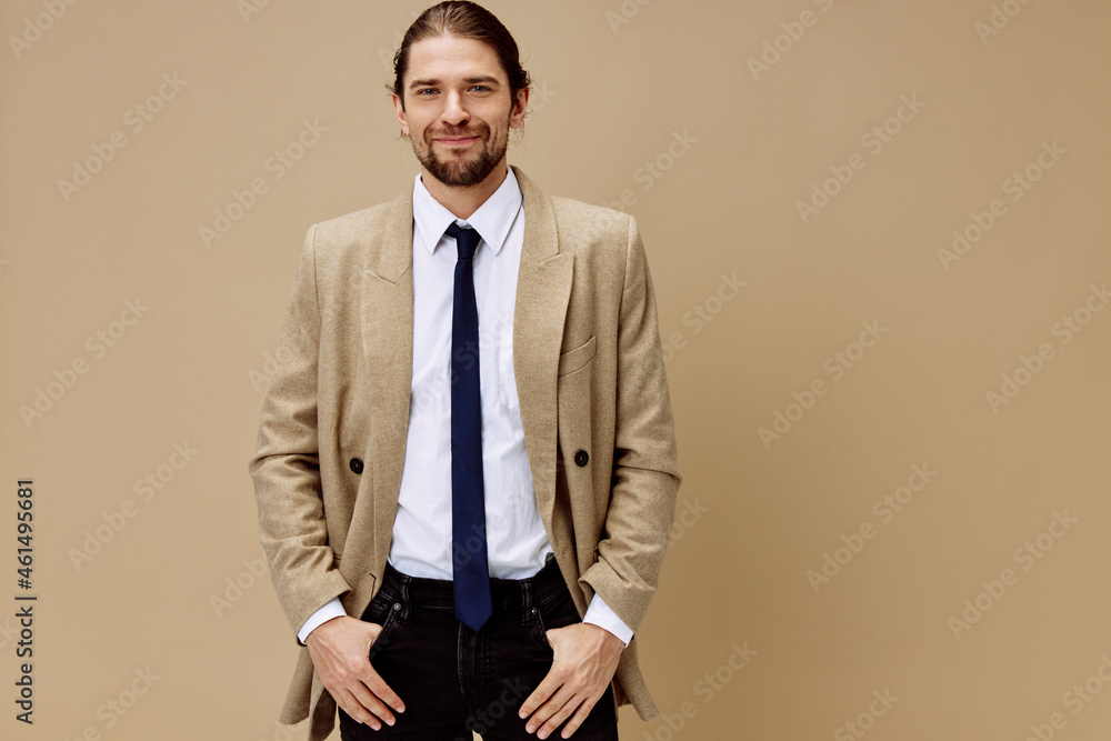 handsome man emotional man in suit gesture with hands beige background handsome man emotional man in suit gesture with hands beige background