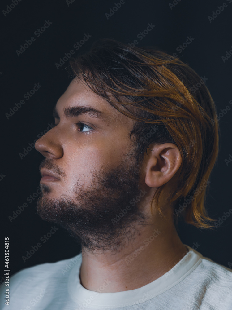 Close up portrait of a young bearded man face Close up portrait of a young bearded man face