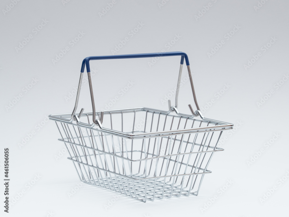 Empty Metal Shopping Basket on White Background Empty Metal Shopping Basket on White Background