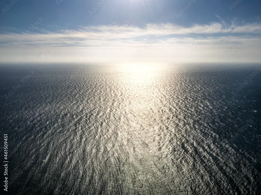 Ocean aerial view at sunset - obrazy, fototapety, plakaty 