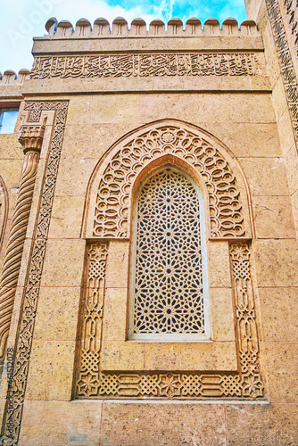 Islamic patterns on facade of Manial Palace mosque, Cairo, Egypt photo