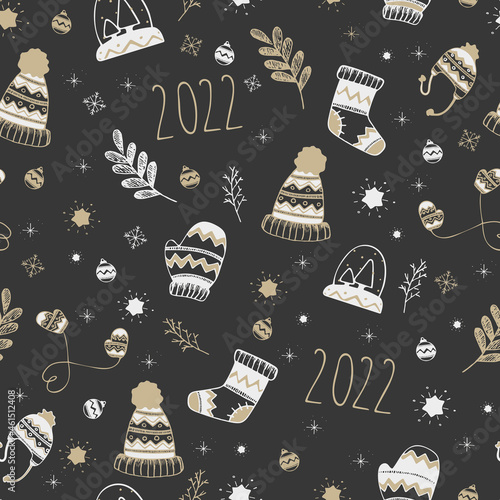 Cute winter  clothes pattern in white black and gold colors.
