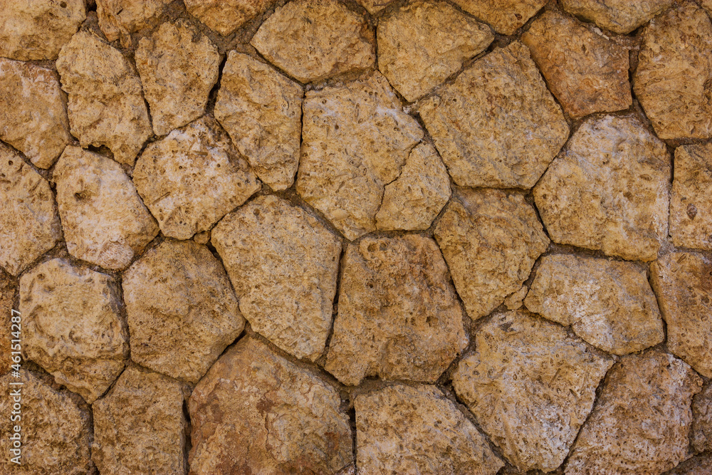 Texture of an beige old stone wall Texture of an beige old stone wall