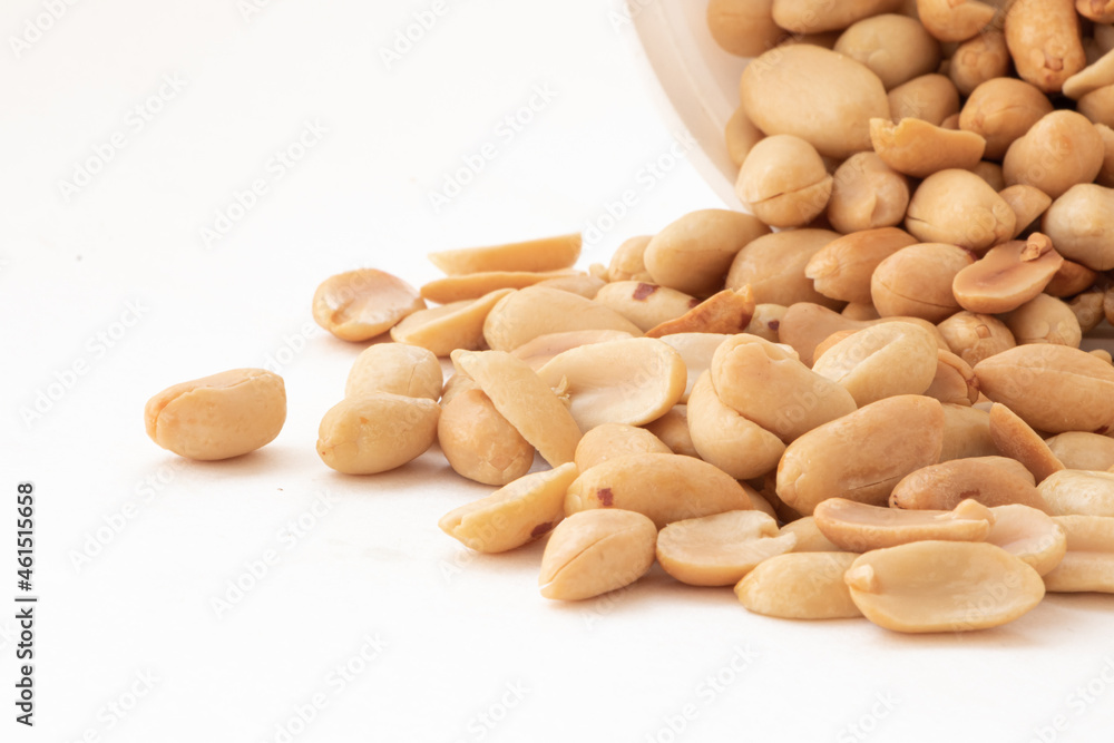 peeled roasted peanut on white background