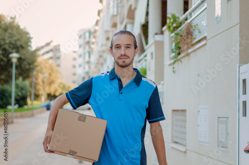 Delivery boy delivering a box