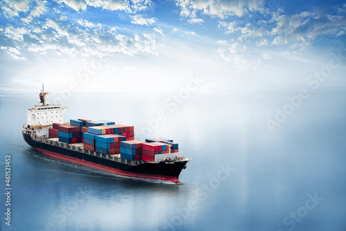 Fototapeta Naklejka Na Ścianę i Meble -  Container cargo ship in the ocean at sunset sky, Global business logistics import export background, Freight transportation, Shipping