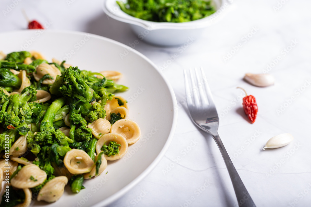 Orecchiette with turnip tops, a typical dish of Italian cuisine Orecchiette with turnip tops, a typical dish of Italian cuisine