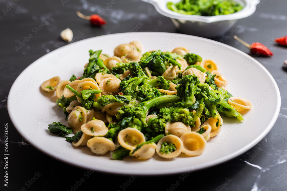 Orecchiette with turnip tops, a typical dish of Italian cuisine Orecchiette with turnip tops, a typical dish of Italian cuisine