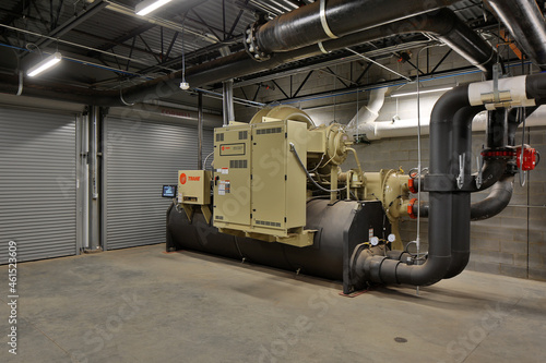 Machine generator electric industrial equipment in building basement