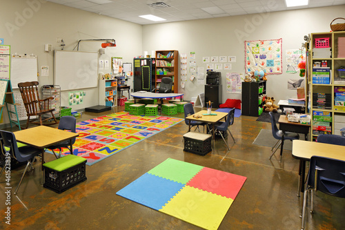 Interior of modern colorful preschool classroom photo