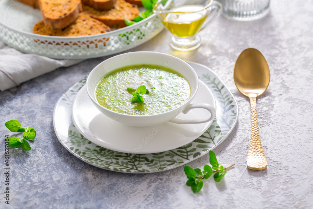 Homemade zucchini soup with tomato ciabatta bread and herbs Homemade zucchini soup with tomato ciabatta bread and herbs