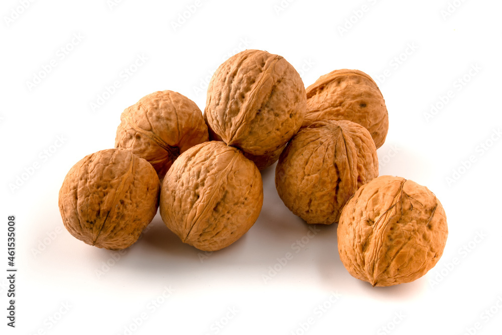 Whole walnuts isolated on white background. Whole walnuts isolated on white background.